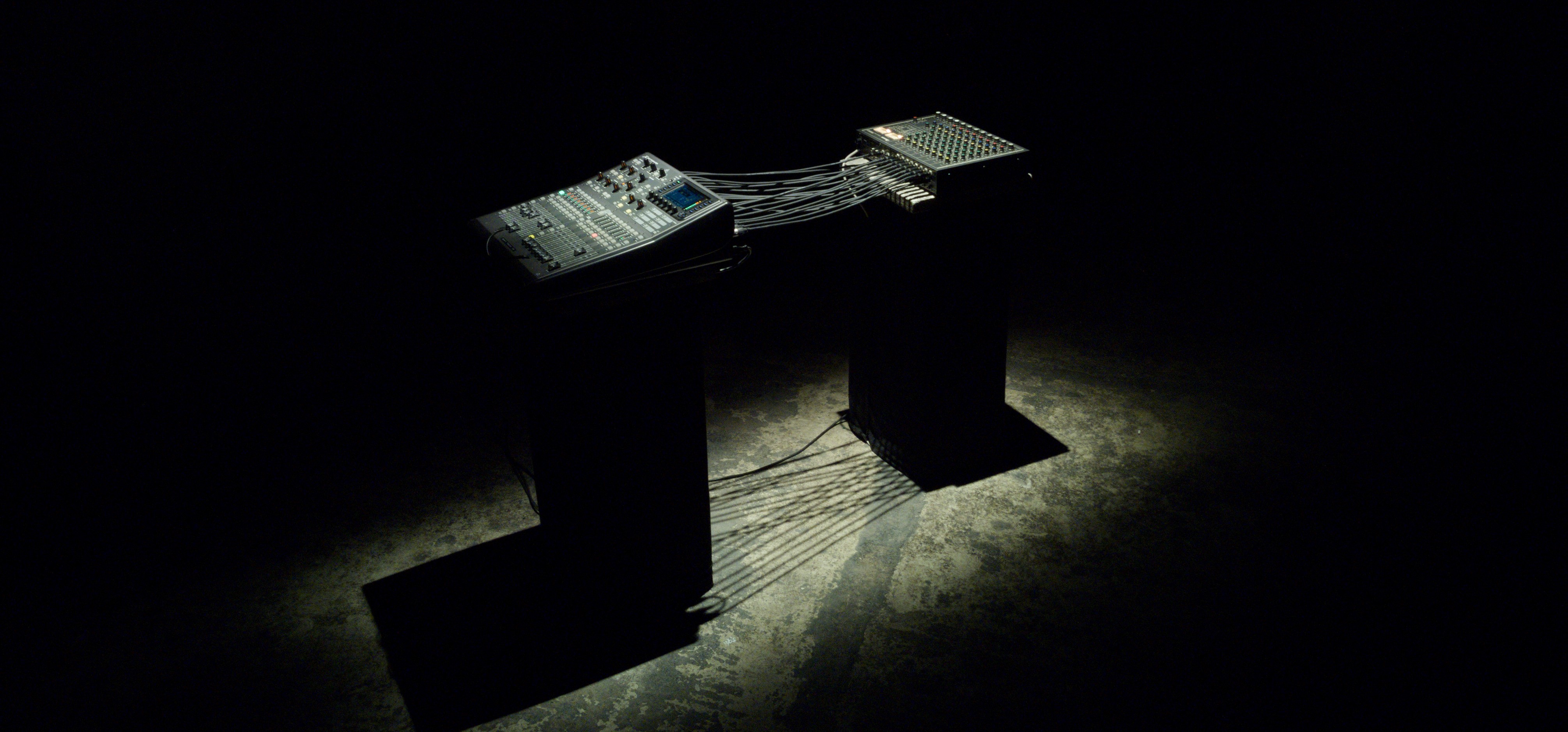 PNIMB#2 mixing desks lit in a dark room, In Conversation with Spectral Agents